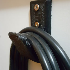 Support de câble discret pour un câblage organisé