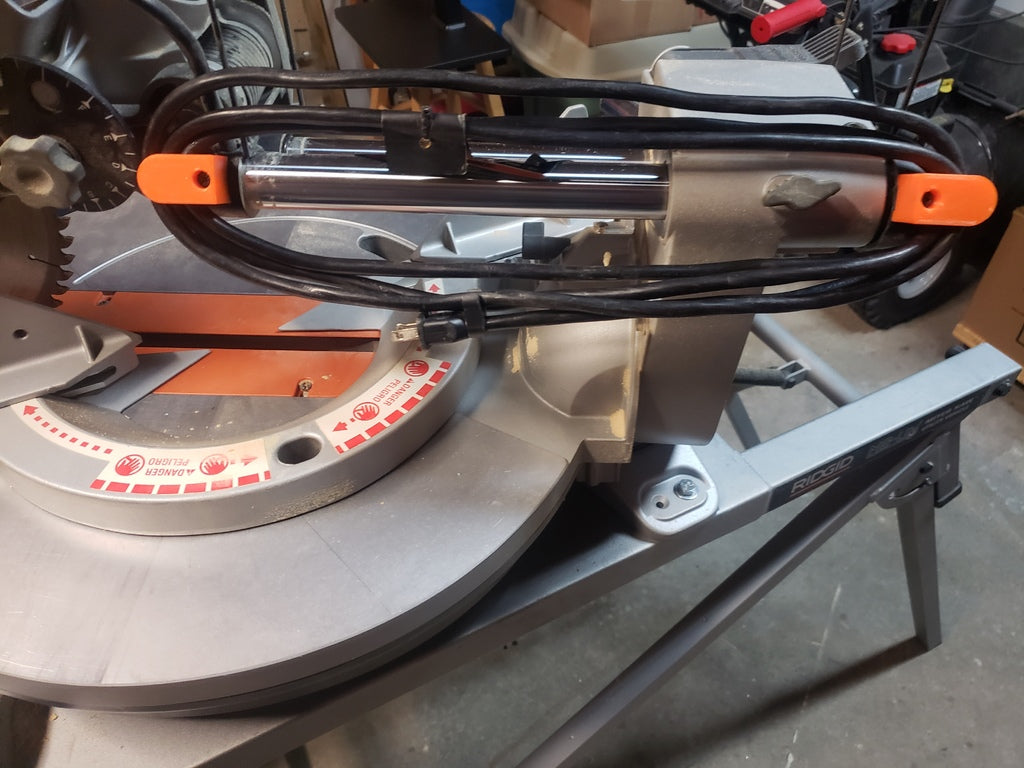 Fixation de câble pour scie à onglet Ridgid