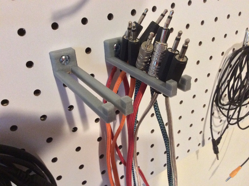 Support de câble 3,5 mm sur tableau perforé