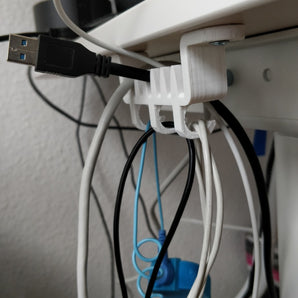 Support de câble et suspension sous le bureau