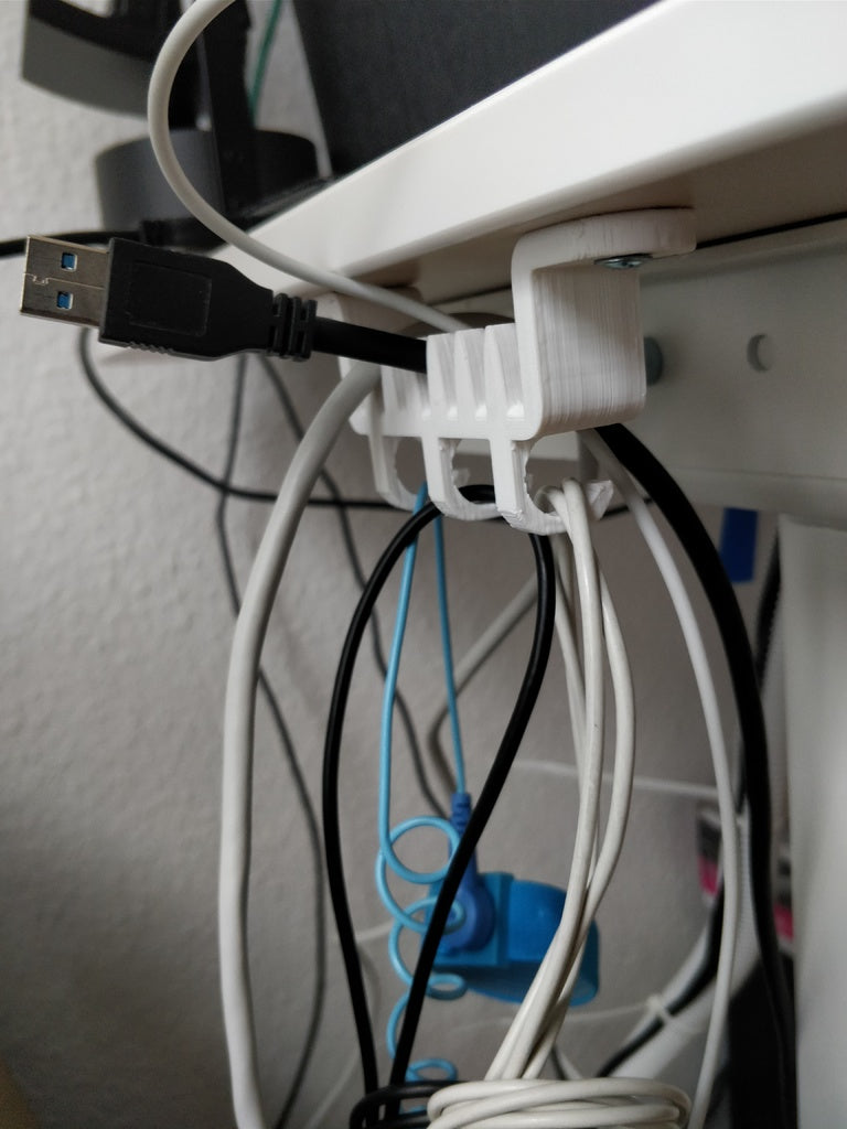 Support de câble sous le bureau