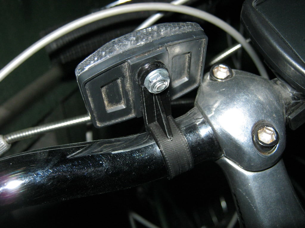 Support de réflecteur de vélo flexible pour guidon