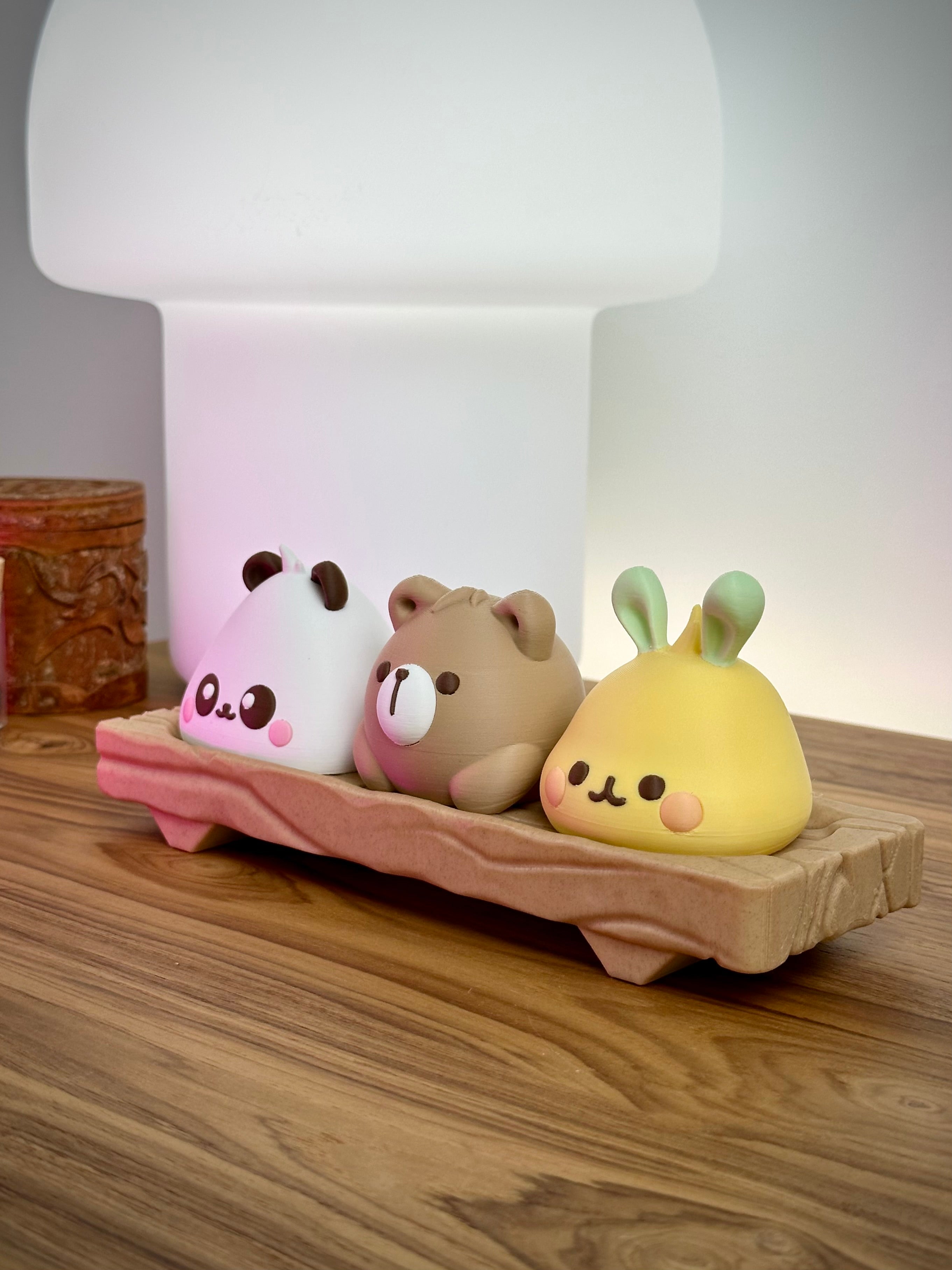 Mignons Baoers d'animaux Kawaii sur bloc de bois