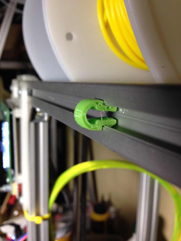 Support de câble rotatif pour profils d'extrusion