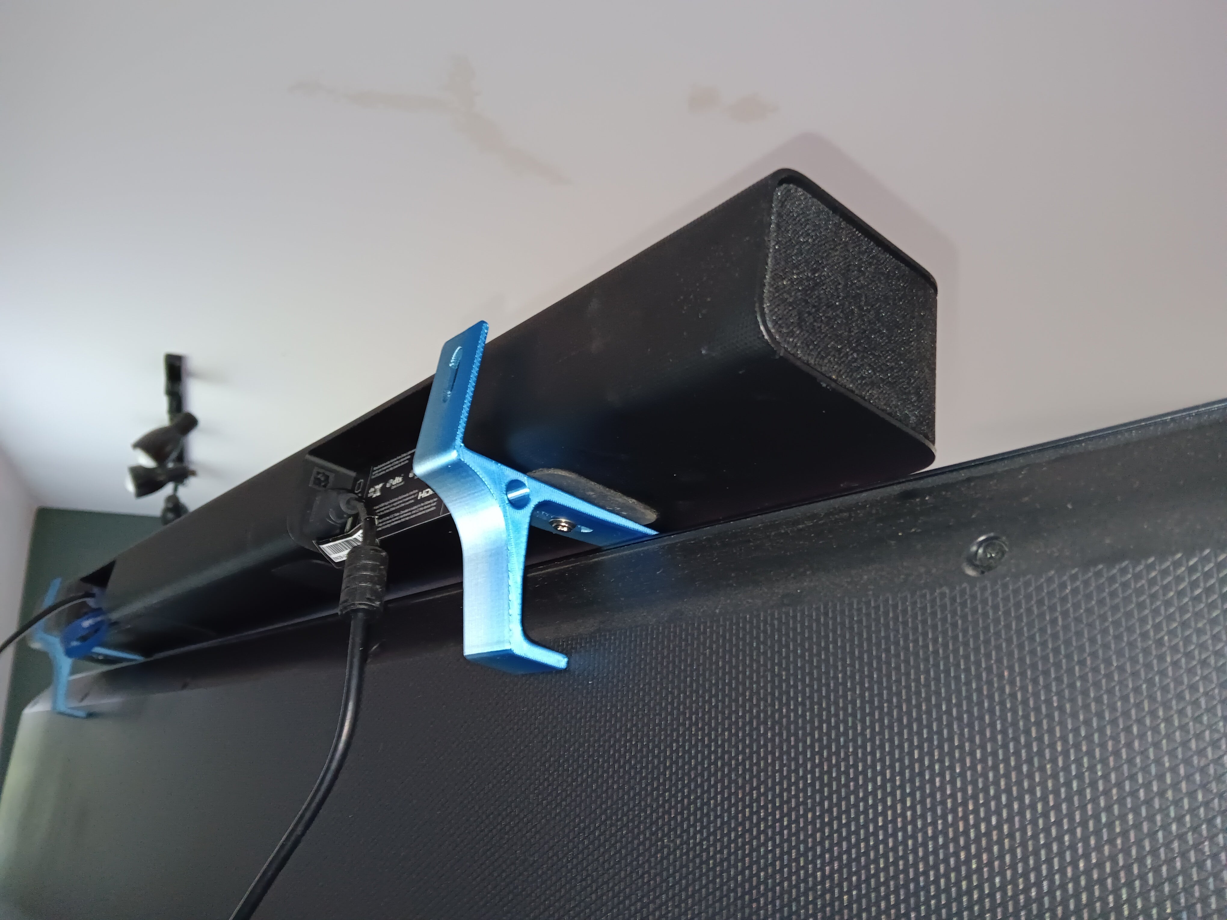 Support de montage universel pour barre de son - Montage supérieur et arrière