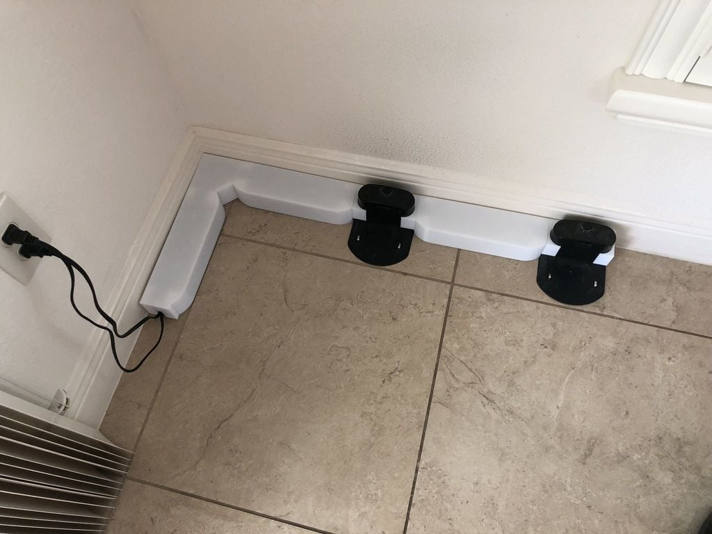 Station d'accueil Roomba et système de gestion des câbles