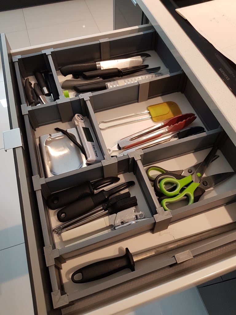 Système de séparation de tiroirs modulaire et réglable