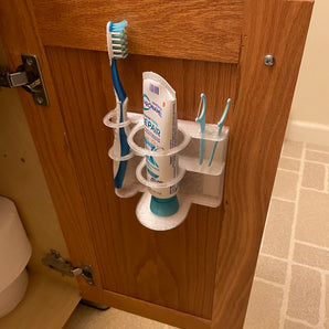 Porte-brosse à dents mural avec espace pour le dentifrice et le fil dentaire