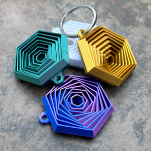 Porte-clés fidget hexagonal
