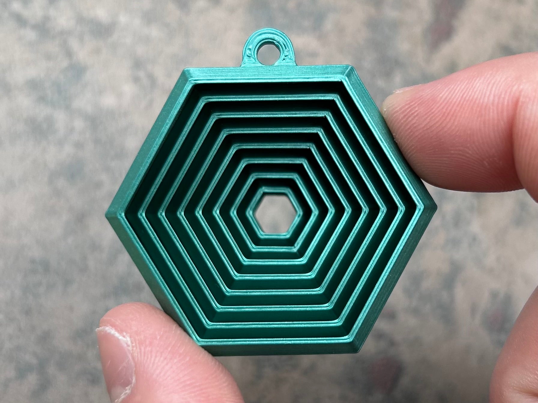 Porte-clés fidget hexagonal