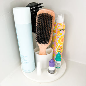 Support rotatif pour outils de coiffure
