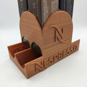 Distributeur Nespresso avec couvercle en forme de dôme pour le stockage des capsules