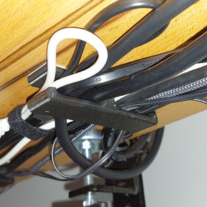 Support de câble discret pour montage sous le bureau