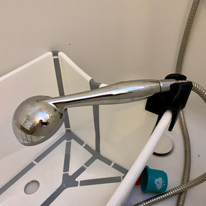 Support de pomme de douche pour baignoire bébé Stokke Flexi Bath
