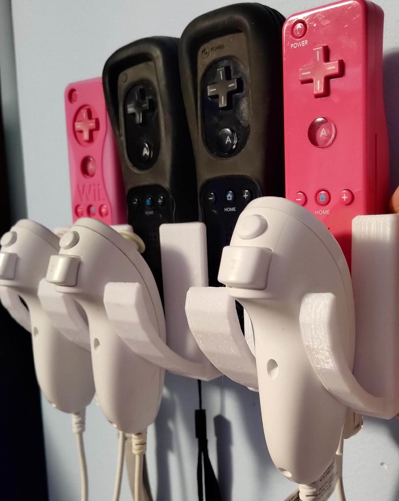 Support mural pour télécommande Wii et Nunchuck