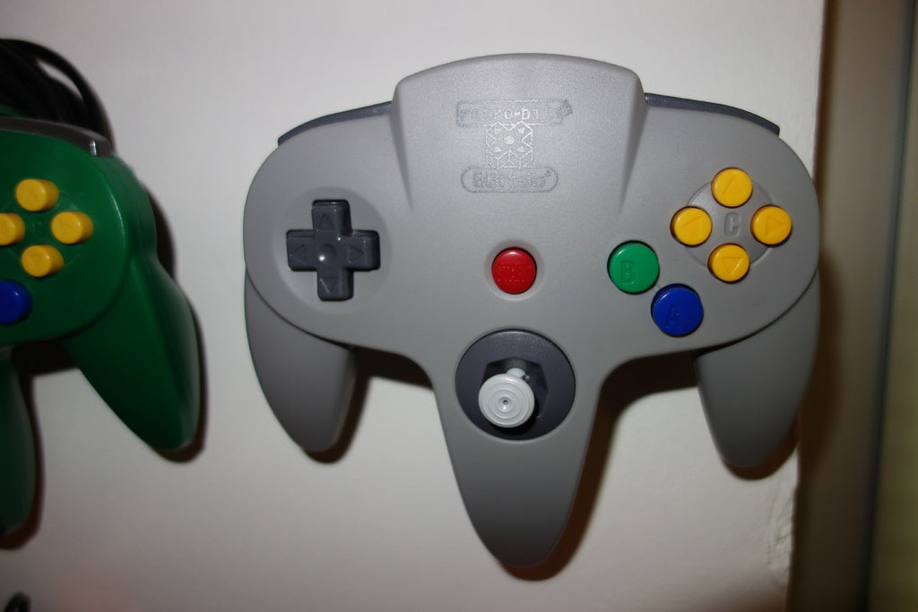 Montage mural pour manette 8bitdo X Retro-Bit 64