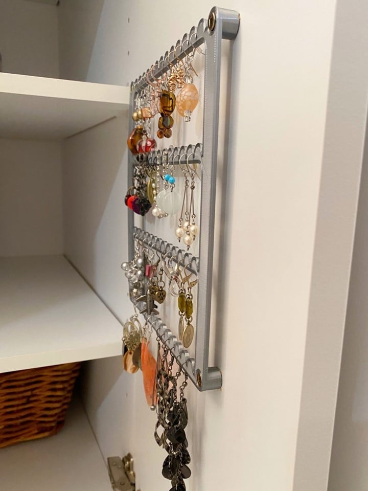 Organisateur et support mural pour boucles d'oreilles