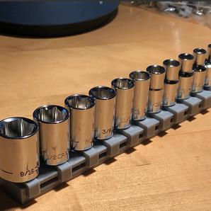 Rail d'organisation efficace pour douilles 1/4"