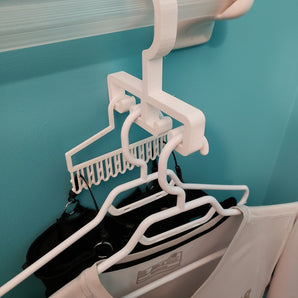 Crochet de séchage intelligent pour cintres sur un porte-serviettes