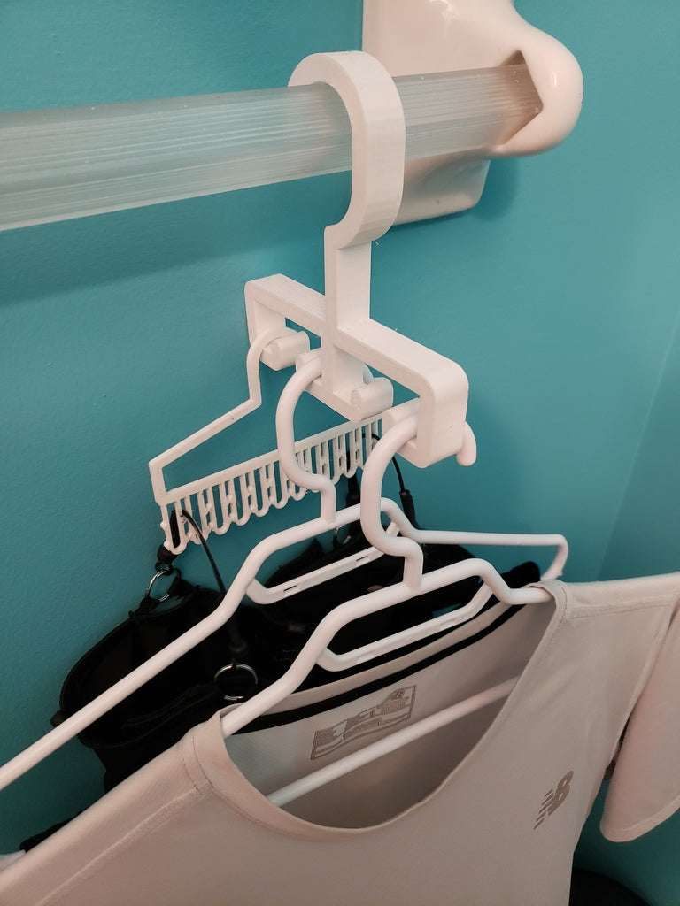 Crochet de séchage intelligent pour cintres sur un porte-serviettes