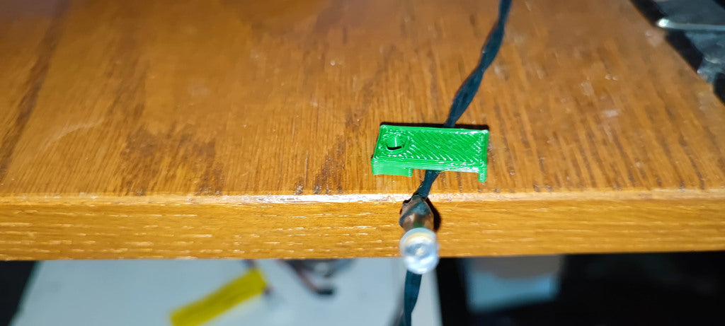 Bande LED et support de câble