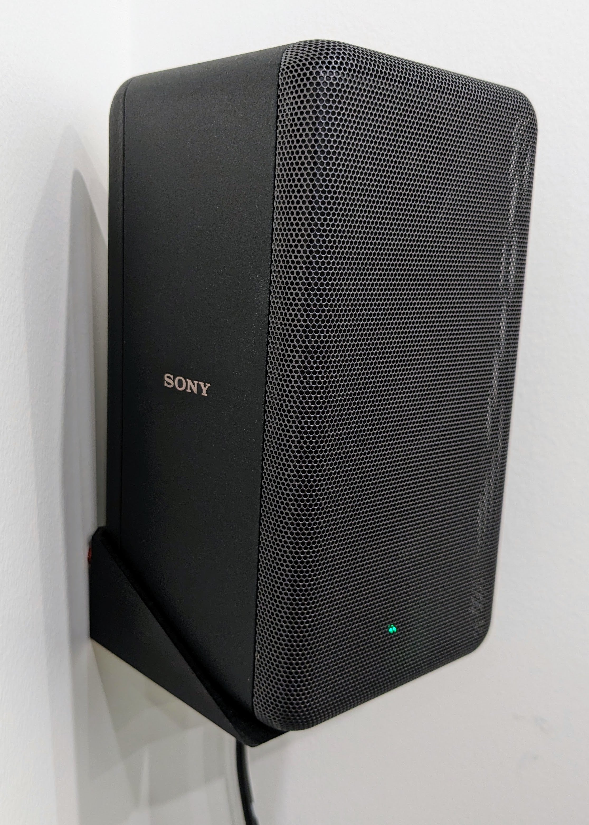 Support mural pour haut-parleur arrière Sony SA-RS3S - Positionnement optimal dans les coins