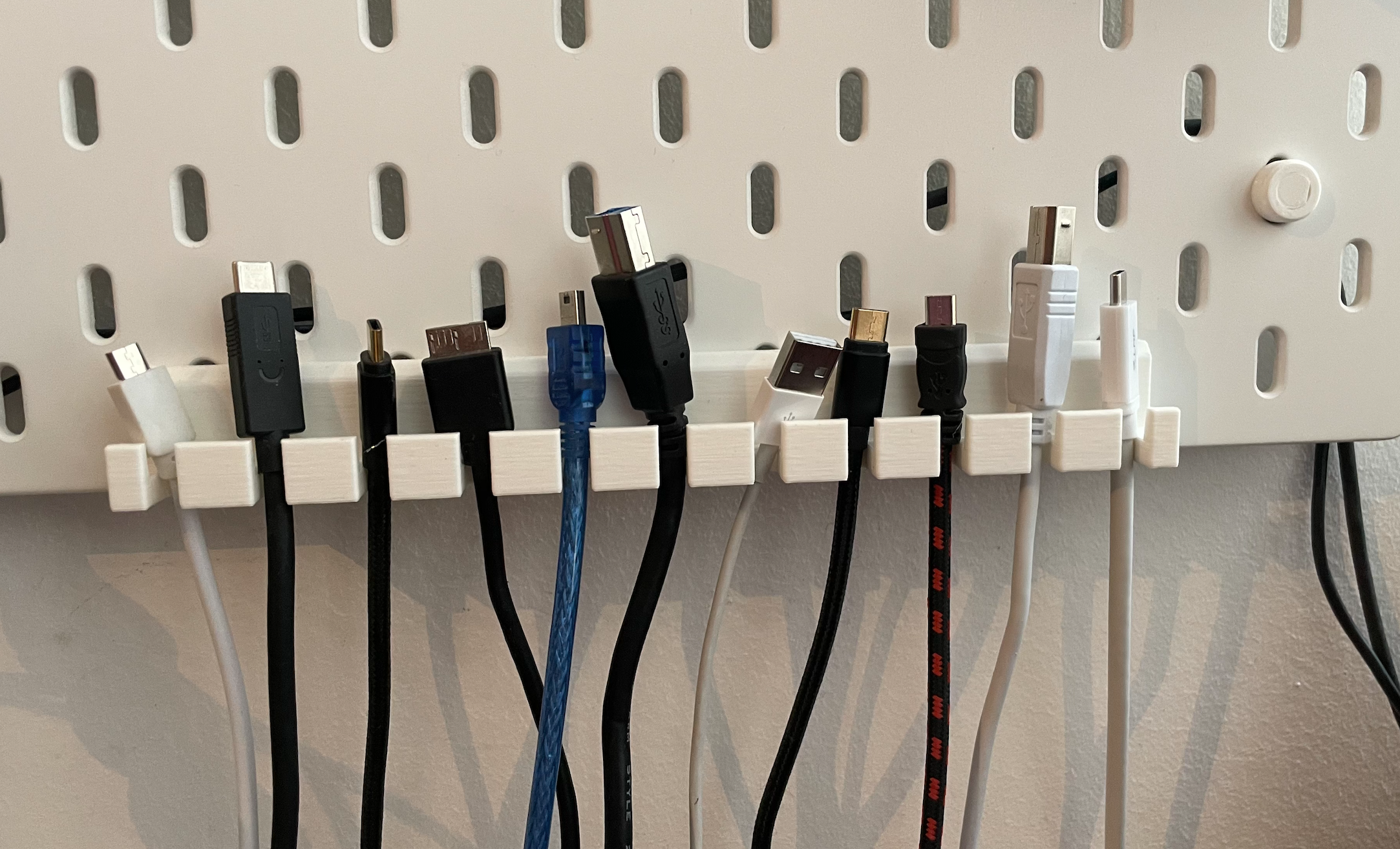 Support de câble USB Skadis