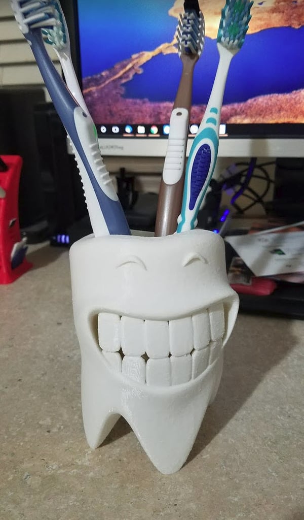 Porte-brosse à dents souriant avec système de drainage