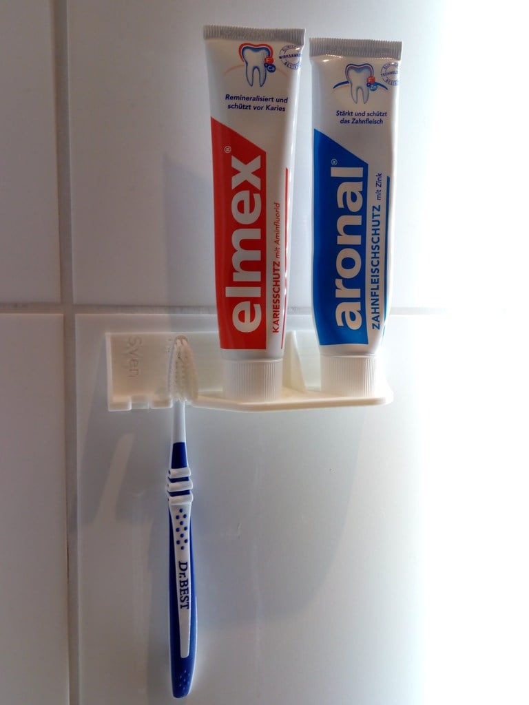 Porte-brosse à dents sans vis pour différents types de brosses
