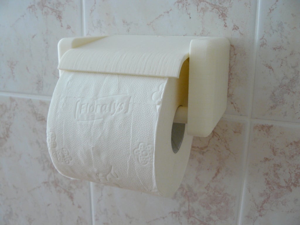 Porte-papier toilette à changement rapide