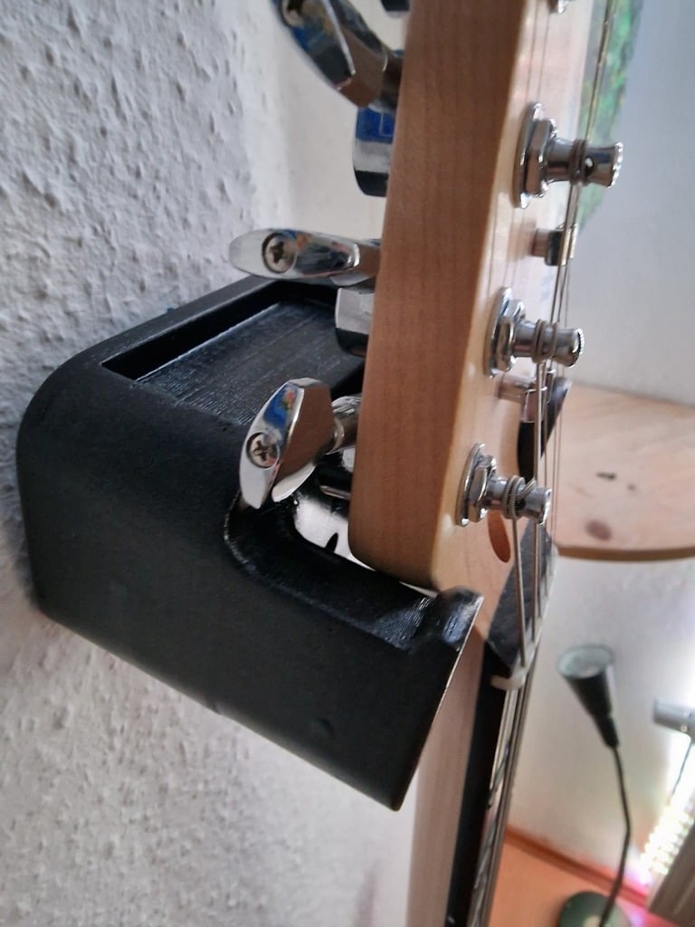 Support de guitare avec espace pour plectres