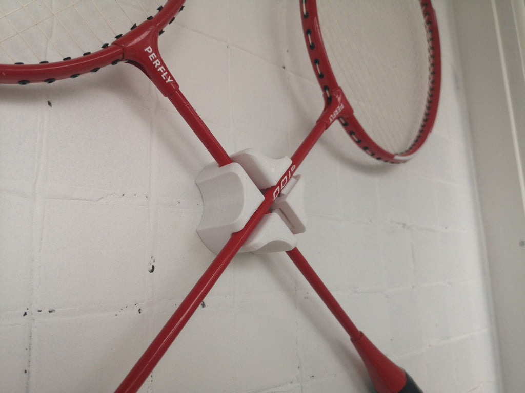 Support mural pour raquette de badminton