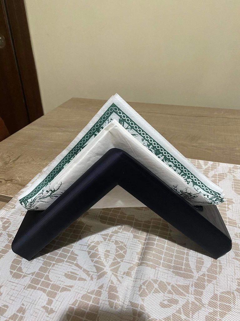 Porte-serviettes triangulaire