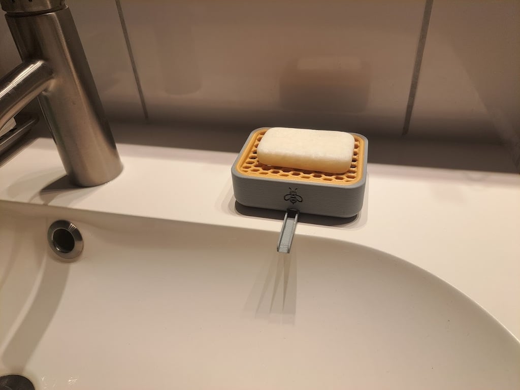 Distributeur de savon avec drain pour salle de bain